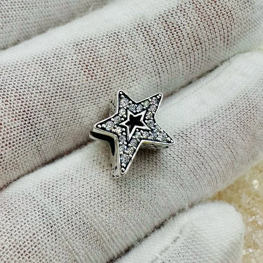 EUC Pandora 790016C01 Sterling Silver Asymmetric Star Charm w/ Clear CZ’s